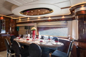 Elegantly set lunch table on luxury yacht Seraph