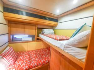 Bunk Beds with orange bed linen